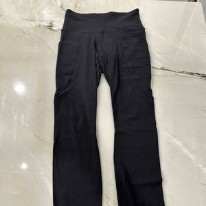 Athleta Salutation stash pocket 7/8 tights. Worn once, great condition